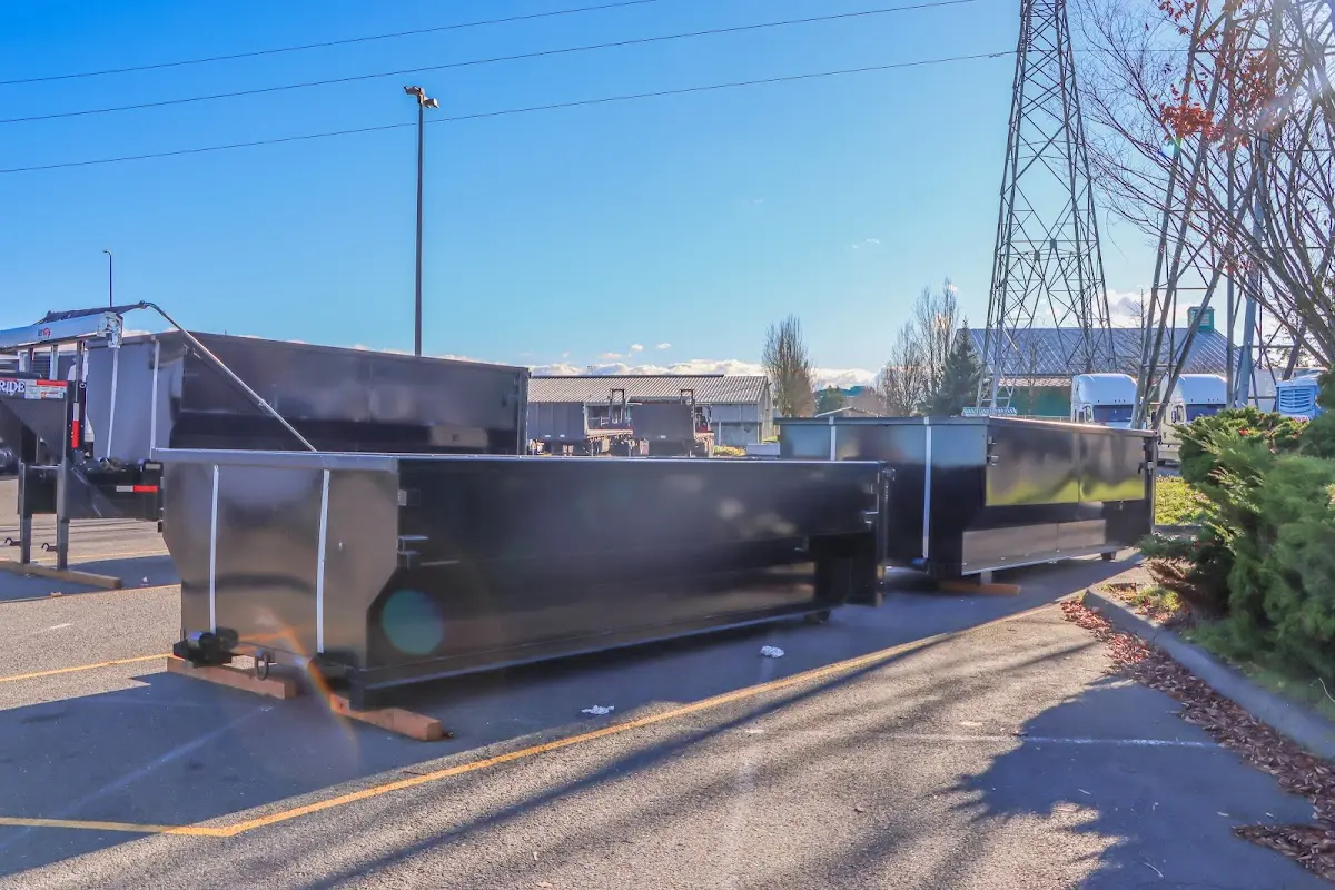 Roll-off dumpster ready for waste disposal at job site for 2 Yard Dumpster Rental in Painesville